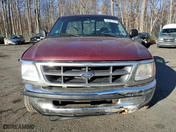 1997 Ford F-150 Standard with VIN 1FTDF1721VNA54544, listed as a Copart auction lot 85661394 with 221,536 mi miles and Salvage Title. Bid and sale history available at carsss.com. Image 5.