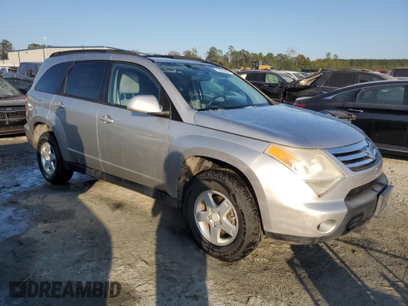2007 Suzuki XL7 with VIN 2S3DB117476127947, listed as a Copart auction lot 74905504 with 136,091 mi miles and Salvage title. Bid and sale history available at DreamBid. Image 4.