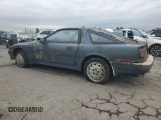1986 Toyota Supra z VIN JT2MA70L5G0019616, wystawiony jako Copart lot #85307554 z przebiegiem 33 961 mil mil oraz Czysty tytuł • Clean title. Historia ofert i sprzedaży dostępna na DreamBid. Obrazek 2.