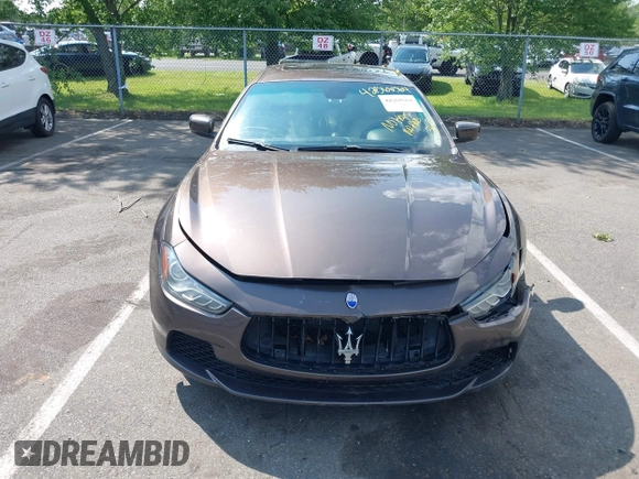 2015 Maserati Ghibli S Q4 with VIN ZAM57RTA7F1154097, listed as a IAAI auction lot 42568564 with 113,436 mi miles and . Bid and sale history available at DreamBid. Image 11.