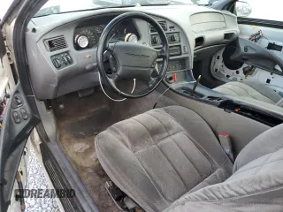 1994 Ford Thunderbird LX with VIN 1FALP62W6RH206764, listed as a Copart auction lot 44213965 with 105,353 mi miles and Salvage Title. Bid and sale history available at DreamBid. Image 8.