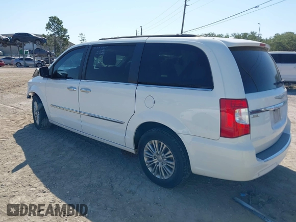 2015 Chrysler Town & Country Touring L with VIN 2C4RC1CG9FR547098, listed as a IAAI auction lot 42135624 with 61,364 mi miles and . Bid and sale history available at DreamBid. Image 3.