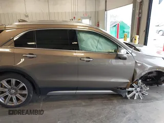 2020 Cadillac XT4 AWD Premium Luxury with VIN 1GYFZDR49LF015590, listed as a IAAI auction lot 41606564 with 47,795 mi miles and . Bid and sale history available at carsss.com. Image 13.