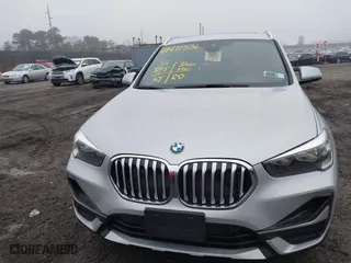 2021 BMW X1 xDrive28i with VIN WBXJG9C04M5T79810, listed as a IAAI auction lot 41471536 with 75,345 mi miles. Bid and sale history available at carsss.com. Image 12.