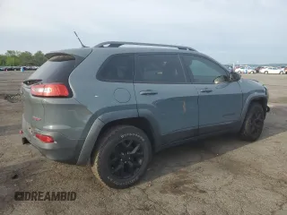 2014 Jeep Cherokee Trailhawk with VIN 1C4PJMBS3EW308706, listed as a Copart auction lot 58307975 with 90,530 mi miles and Salvage title. Bid and sale history available at DreamBid. Image 3.