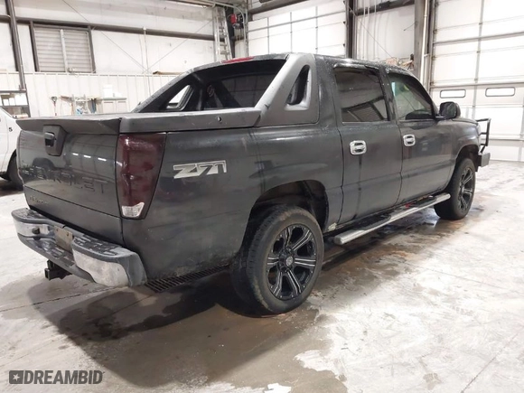 2005 Chevrolet Avalanche Z71 with VIN 3GNEK12Z35G291816, listed as a IAAI auction lot 41715344 with 247,353 mi miles. Bid and sale history available at carsss.com. Image 4.