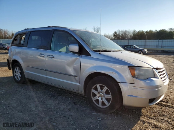 2010 Chrysler Town & Country Touring with VIN 2A4RR5D12AR451235, listed as a Copart auction lot 49587445 with 252,999 mi miles and Salvage Title. Bid and sale history available at carsss.com. Image 4.