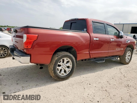 2016 Nissan Titan SL z VIN 1N6BA1F4XGN500750, wystawiony jako Copart lot #57608135 z przebiegiem 126 525 mil mil oraz Czysty tytuł • Clean title. Historia ofert i sprzedaży dostępna na DreamBid. Obrazek 3.