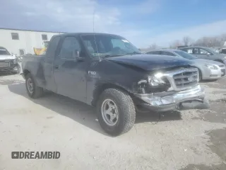 2000 Ford F-150 XL with VIN 1FTZX072XYKA48583, listed as a Copart auction lot 89140115 with Not provided miles and Salvage title. Bid and sale history available at DreamBid. Image 4.