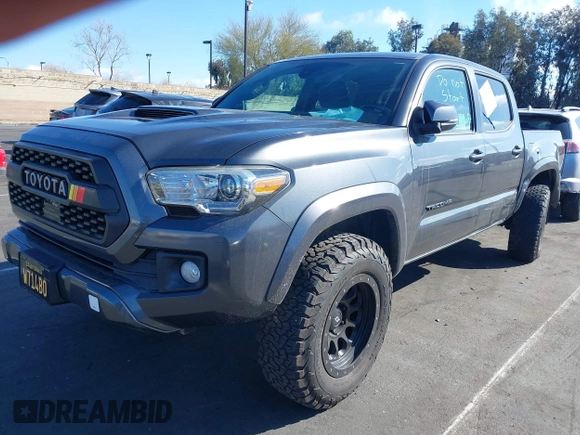 2018 Toyota Tacoma SR5 z VIN 3TMAZ5CN0JM077058, wystawiony jako IAAI lot #41685472 z przebiegiem 37 945 mil mil oraz . Historia ofert i sprzedaży dostępna na DreamBid. Obrazek 20.