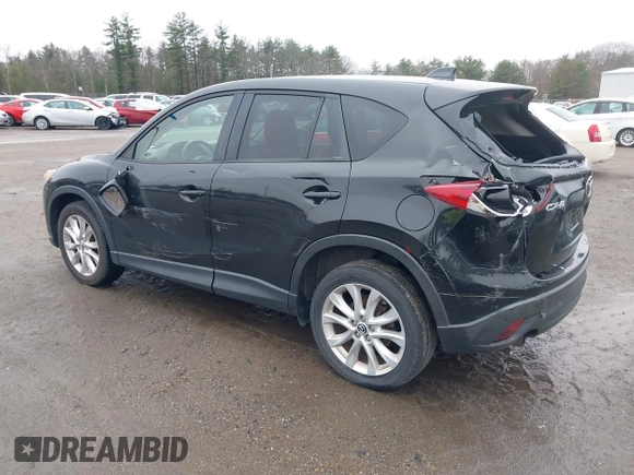 2013 Mazda CX-5 Grand Touring with VIN JM3KE2DEXD0124270, listed as a IAAI auction lot 41942120 with 109,087 mi miles. Bid and sale history available at carsss.com. Image 3.