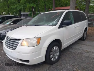 2009 Chrysler Town & Country LX with VIN 2A8HR44E39R606779, listed as a IAAI auction lot 42059256 with 177,228 mi miles and . Bid and sale history available at DreamBid. Image 2.