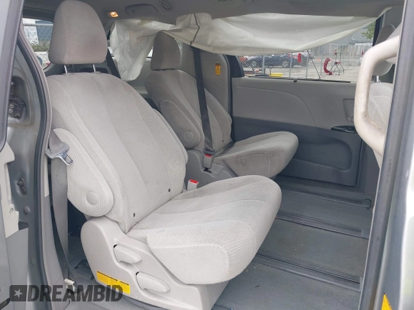 2014 Toyota Sienna LE with VIN 5TDJK3DC1ES080711, listed as a IAAI auction lot 41910679 with 118,788 mi miles and . Bid and sale history available at DreamBid. Image 8.