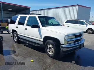1999 Chevrolet Tahoe Z71 with VIN 1GNEK13R3XJ412067, listed as a IAAI auction lot 41789660 with 196,916 mi miles and . Bid and sale history available at DreamBid. Image 1.
