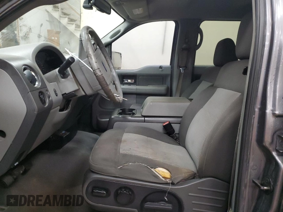 2006 Ford F-150 XLT with VIN 1FTPW14586FB79905, listed as a Copart auction lot 85707984 with 196,039 mi miles and Salvage title. Bid and sale history available at DreamBid. Image 7.