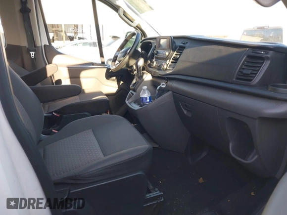 2021 Ford Transit Passenger XL z VIN 1FBAX2Y89MKA49850, wystawiony jako IAAI lot #41602893 z przebiegiem 74 248 mil mil oraz . Historia ofert i sprzedaży dostępna na DreamBid. Obrazek 5.