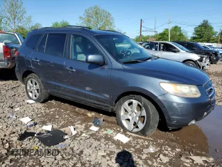 2007 Hyundai Santa Fe SE with VIN 5NMSH73E77H125590, listed as a Copart auction lot 56224455 with 185,319 mi miles and Salvage title. Bid and sale history available at DreamBid. Image 4.