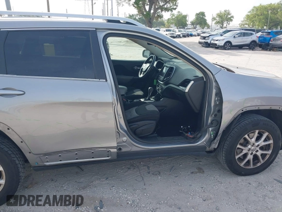 2014 Jeep Cherokee Altitude with VIN 1C4PJMCB4EW107556, listed as a IAAI auction lot 41881448 with 212,816 mi miles and . Bid and sale history available at DreamBid. Image 6.