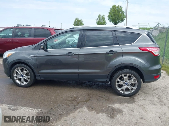2015 Ford Escape Titanium with VIN 1FMCU0J90FUA25086, listed as a IAAI auction lot 41993681 with 126,170 mi miles. Bid and sale history available at carsss.com. Image 14.