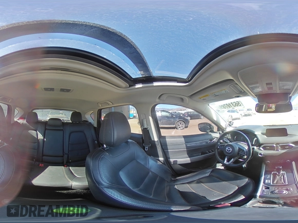 2019 Mazda CX-5 Grand Touring with VIN JM3KFADM6K0543888, listed as a Copart auction lot 56310785 with 112,737 mi miles and Salvage title. Bid and sale history available at DreamBid. Image 16.