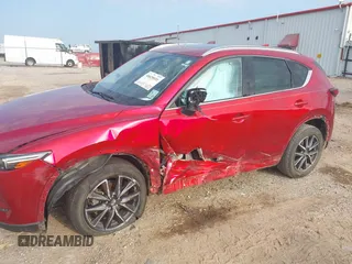 2017 Mazda CX-5 Grand Touring with VIN JM3KFADL8H0189033, listed as a IAAI auction lot 40029931 with 88,933 mi miles and . Bid and sale history available at carsss.com. Image 6.