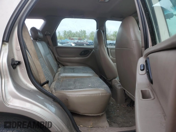 2001 Ford Escape XLS with VIN 1FMYU02111KA37010, listed as a Copart auction lot 52328415 with 312,425 mi miles and Salvage title. Bid and sale history available at DreamBid. Image 11.