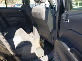 2013 Jeep Patriot Latitude with VIN 1C4NJPFA5DD230031, listed as a IAAI auction lot 41641768 with 153,910 mi miles. Bid and sale history available at carsss.com. Image 8.