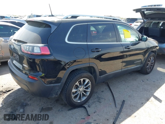 2019 Jeep Cherokee Latitude Plus with VIN 1C4PJLLB0KD358852, listed as a IAAI auction lot 41794999 with 112,667 mi miles. Bid and sale history available at carsss.com. Image 4.