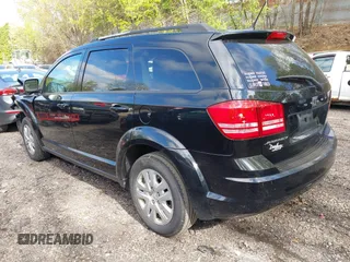 2017 Dodge Journey SE z VIN 3C4PDCAB6HT697631, wystawiony jako IAAI lot #42200146 z przebiegiem 158 511 mil mil oraz . Historia ofert i sprzedaży dostępna na DreamBid. Obrazek 3.