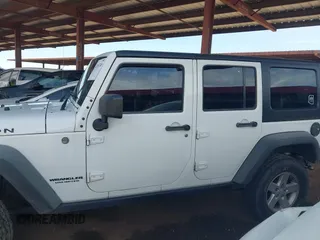 2015 Jeep Wrangler Unlimited Rubicon with VIN 1C4BJWFG9FL744927, listed as a IAAI auction lot 42169740 with 106,352 mi miles and . Bid and sale history available at DreamBid. Image 15.
