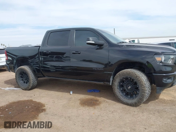 2019 Ram 1500 Big Horn/Lone Star with VIN 1C6SRFFT0KN751969, listed as a IAAI auction lot 41731290 with 127,111 mi miles. Bid and sale history available at carsss.com. Image 13.
