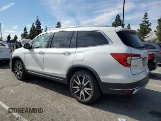 2021 Honda Pilot Elite with VIN 5FNYF6H02MB029791, listed as a Copart auction lot 42829435 with 54,403 mi miles and Salvage Title. Bid and sale history available at DreamBid. Image 2.