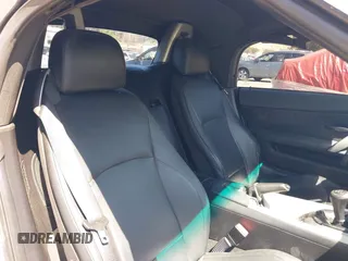 2004 BMW Z4 2.5i with VIN 4USBT33454LR66908, listed as a IAAI auction lot 42013003 with 71,368 mi miles and . Bid and sale history available at DreamBid. Image 8.