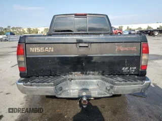 2000 Nissan Frontier XE with VIN 1N6ED27T7YC300373, listed as a Copart auction lot 55829535 with 301,305 mi miles and Salvage title. Bid and sale history available at DreamBid. Image 6.