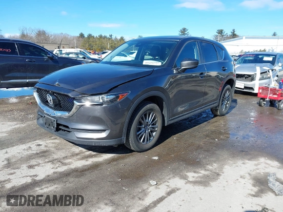 2017 Mazda CX-5 Touring with VIN JM3KFBCL3H0214881, listed as a IAAI auction lot 41694560 with 64,609 mi miles. Bid and sale history available at carsss.com. Image 17.