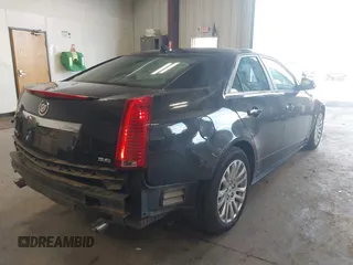 2011 Cadillac CTS Performance with VIN 1G6DL5ED6B0131490, listed as a IAAI auction lot 41980231 with 75,040 mi miles and . Bid and sale history available at DreamBid. Image 4.