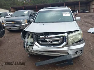 2011 Honda Pilot EX-L with VIN 5FNYF3H6XBB036391, listed as a IAAI auction lot 41100998 with 120,516 mi miles and . Bid and sale history available at DreamBid. Image 12.