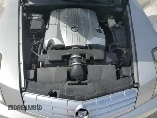 2004 Cadillac XLR z VIN 1G6YV34A945601007, wystawiony jako Copart lot #77077394 z przebiegiem Nie podano mil oraz Szkody całkowita. Historia ofert i sprzedaży dostępna na DreamBid. Obrazek 11.