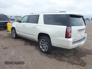 2015 GMC Yukon XL Denali with VIN 1GKS2JKJ7FR641430, listed as a IAAI auction lot 42163969 with 129,085 mi miles. Bid and sale history available at carsss.com. Image 3.