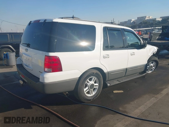 2003 Ford Expedition Special Service with VIN 1FMPU16LX3LB18730, listed as a IAAI auction lot 41291375 with 203,841 mi miles. Bid and sale history available at carsss.com. Image 4.