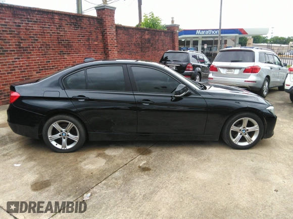 2015 BMW 3 Series 328i xDrive with VIN WBA3B3G50FNR88402, listed as a IAAI auction lot 42368174 with 214,471 mi miles and . Bid and sale history available at DreamBid. Image 13.