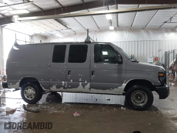 2014 Ford Econoline Cargo Commercial with VIN 1FTNE2EW4EDA64221, listed as a IAAI auction lot 41628147 with 190,018 mi miles and . Bid and sale history available at DreamBid. Image 13.