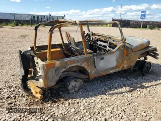 1992 Jeep Wrangler z VIN 2J4FY19P5NJ502467, wystawiony jako Copart lot #77054933 z przebiegiem Nie podano mil oraz Czysty tytuł • Clean title. Historia ofert i sprzedaży dostępna na DreamBid. Obrazek 3.