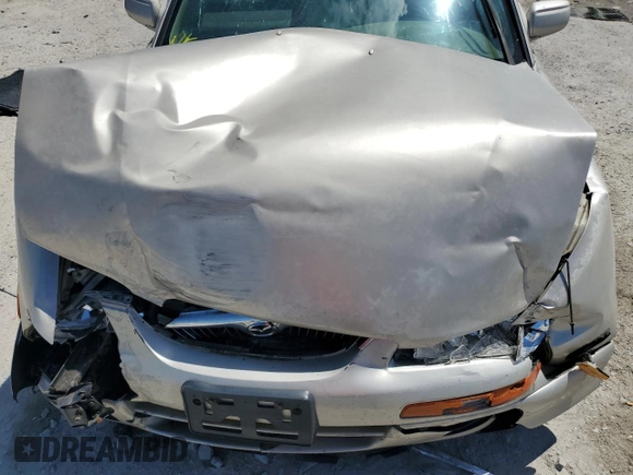 2000 Mazda Millenia with VIN JM1TA2210Y1614967, listed as a Copart auction lot 53606185 with 120,288 mi miles and Salvage Title. Bid and sale history available at DreamBid. Image 11.