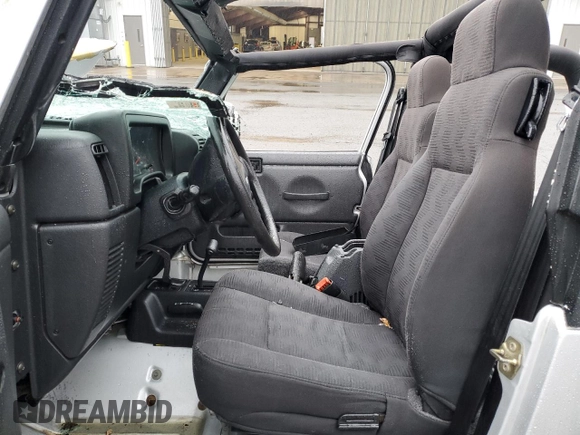 2004 Jeep Wrangler Sport with VIN 1J4FA49S64P767393, listed as a Copart auction lot 51662605 with 165,942 mi miles and Salvage Title. Bid and sale history available at carsss.com. Image 7.