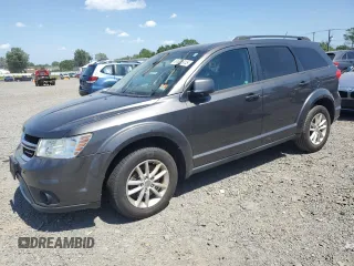 2015 Dodge Journey SXT with VIN 3C4PDDBG8FT715799, listed as a Copart auction lot 61681915 with 128,164 mi miles and Clean title. Bid and sale history available at DreamBid. Image 1.