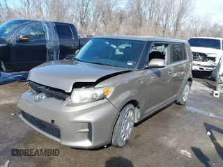2012 Scion xB with VIN JTLZE4FE8C1144563, listed as a IAAI auction lot 41695722 with 220,706 mi miles and . Bid and sale history available at DreamBid. Image 2.