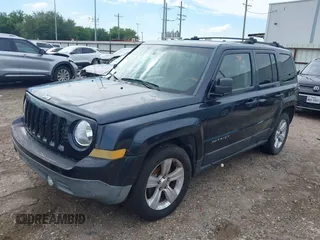 2014 Jeep Patriot Latitude with VIN 1C4NJPFA2ED564275, listed as a IAAI auction lot 42371032 with 221,965 mi miles and . Bid and sale history available at DreamBid. Image 2.