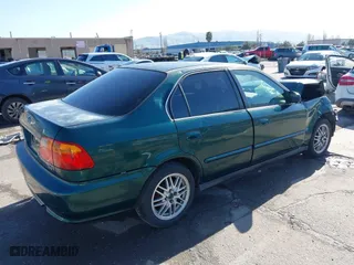 2000 Honda Civic EX with VIN 1HGEJ8642YL051958, listed as a IAAI auction lot 41826212 with 183,001 mi miles. Bid and sale history available at carsss.com. Image 4.