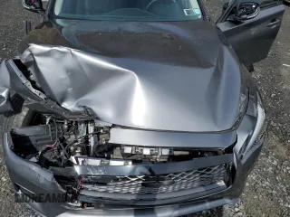 2019 Infiniti Q50 Luxe with VIN JN1EV7AR7KM557600, listed as a Copart auction lot 52033465 with 48,542 mi miles and Salvage title. Bid and sale history available at DreamBid. Image 12.